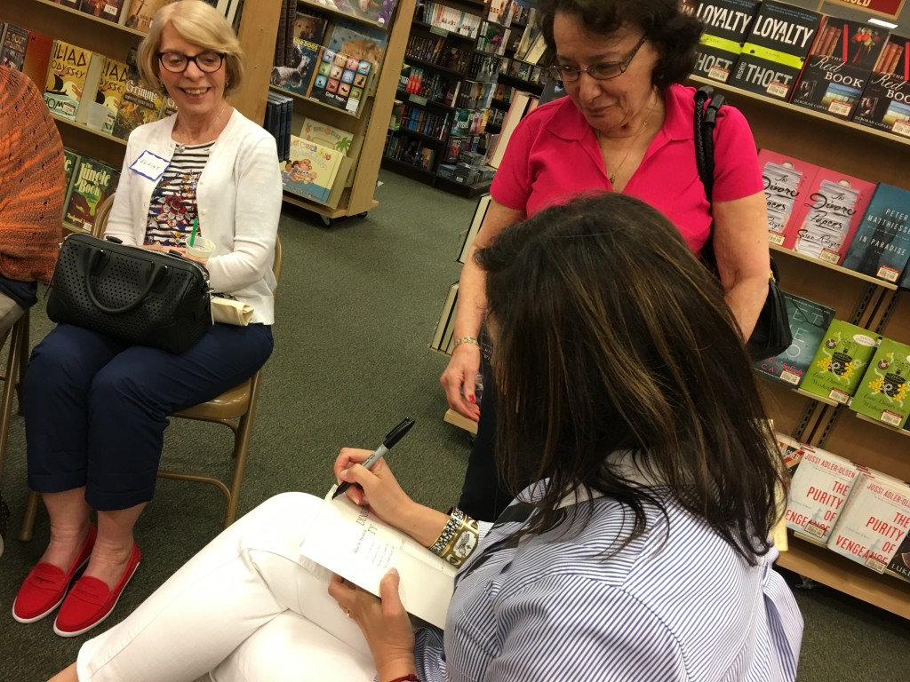 Brenda signed copies of her book, The Dinner Party.